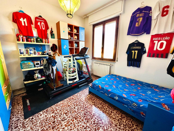 Ingrandisci la foto