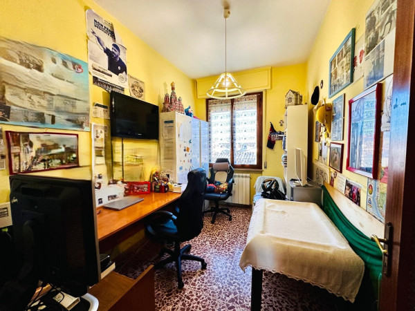 Ingrandisci la foto