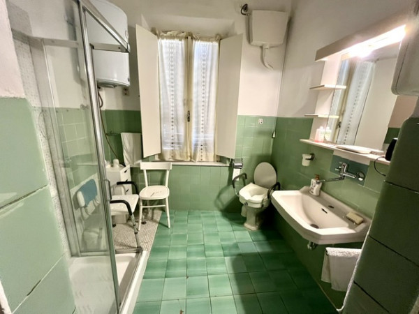 Ingrandisci la foto