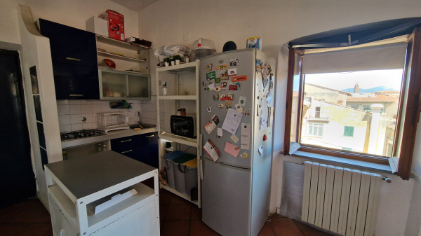 Ingrandisci la foto