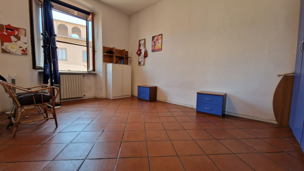 Ingrandisci la foto
