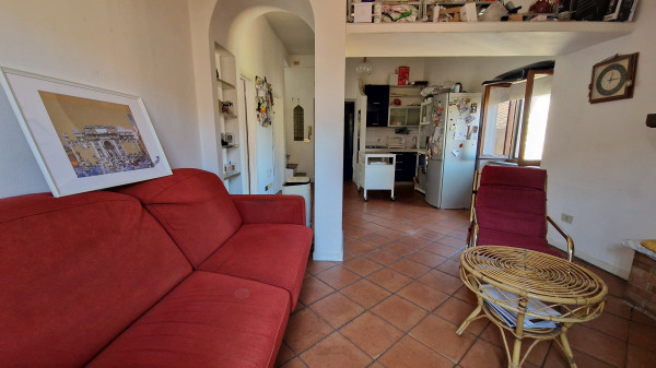 Ingrandisci la foto
