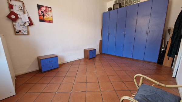 Ingrandisci la foto