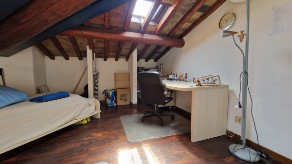 Ingrandisci la foto