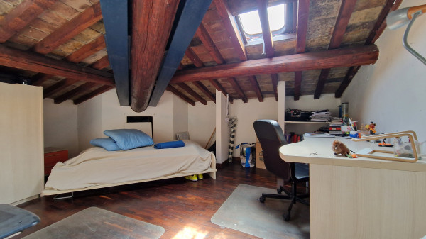 Ingrandisci la foto