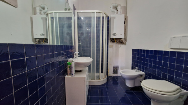 Ingrandisci la foto