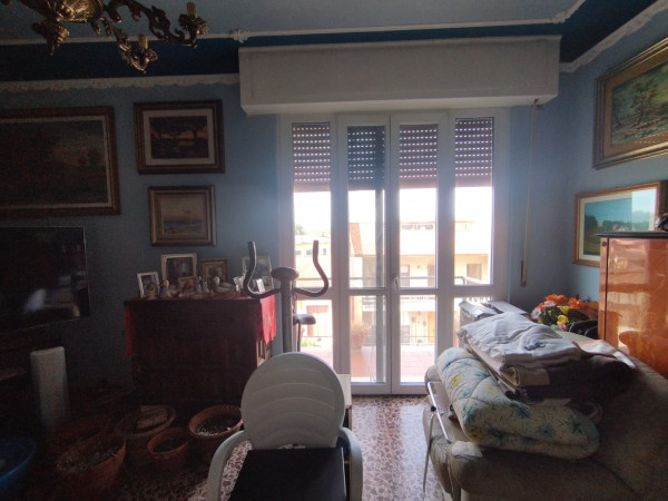 Ingrandisci la foto