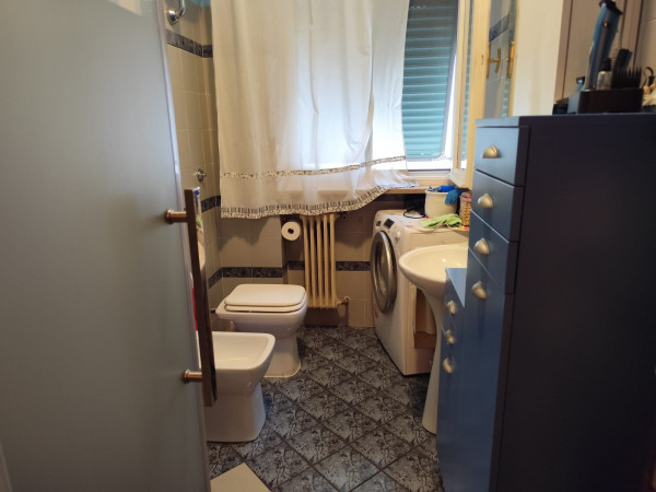 Ingrandisci la foto