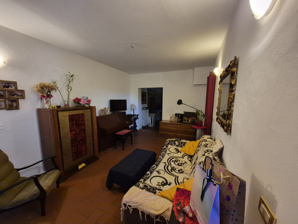 Ingrandisci la foto