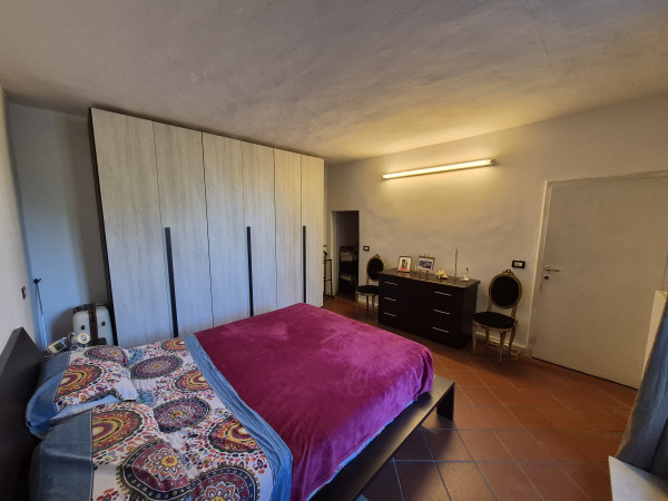 Ingrandisci la foto